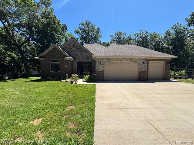 front view picture of 1831 Hill Rd, White Lake, MI. 48383