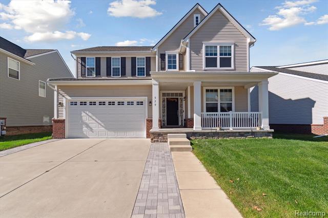 front view picture of 579 Fletcher St, Wixom, MI. 48393
