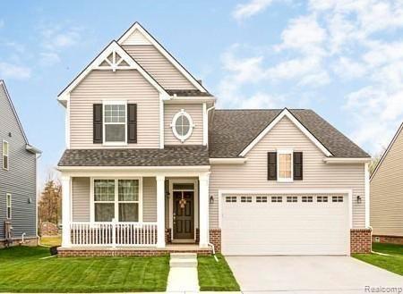 front view picture of 3060 Madison St, Wixom, MI. 48393