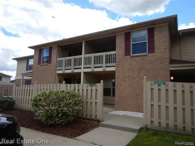 front view picture of 61161 Greenwood Dr, South Lyon, MI. 48178