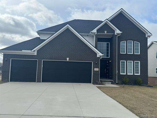front view picture of 55597 Worlington Ln, South Lyon, MI. 48178