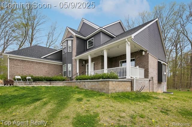 front view picture of 59419 Deer Haven Dr, South Lyon, MI. 48178