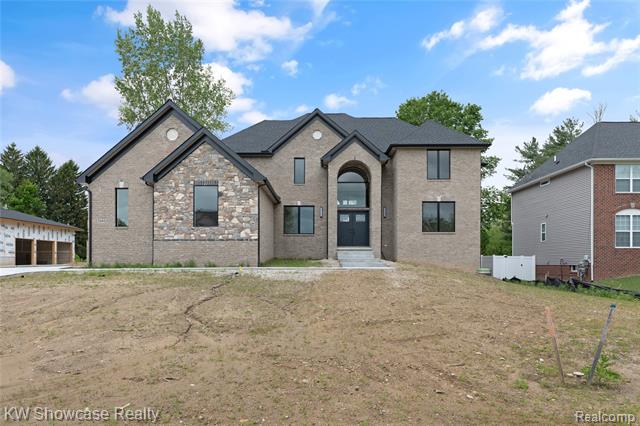 front view picture of 5245 Buell Dr, Commerce Township, MI. 48382