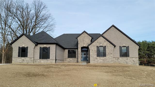 front view picture of 56232 Hickory Creek Ln, New Hudson, MI. 48165