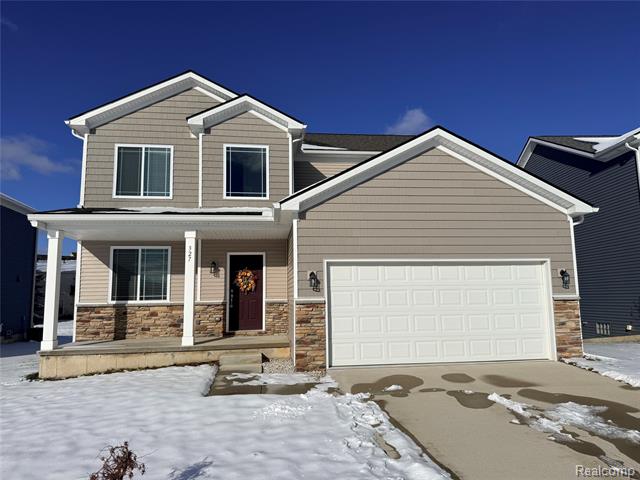 front view picture of 327 Hidden River East, Holly, MI. 48442