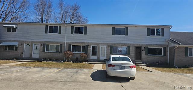 front view picture of 27370 Spaulding Rd # 4, New Hudson, MI. 48165