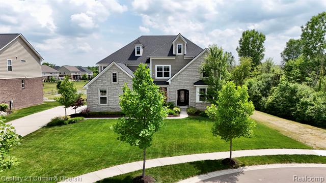 front view picture of 51553 Bloom Ct, South Lyon, MI. 48178