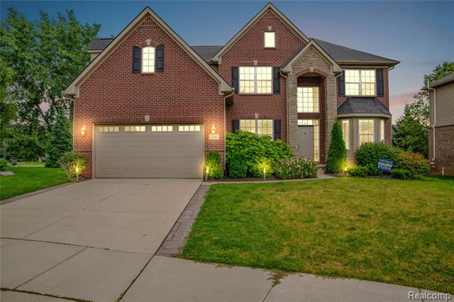 front view picture of 124 Shannon Partin Blvd, South Lyon, MI. 48178
