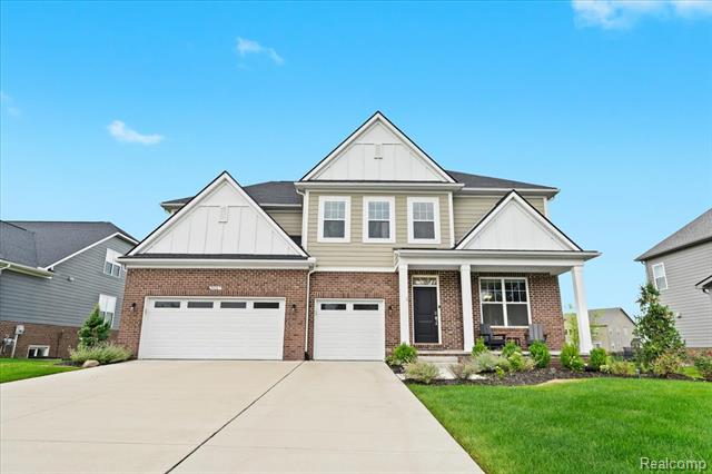 front view picture of 24267 Oak Ridge Blvd, South Lyon, MI. 48178