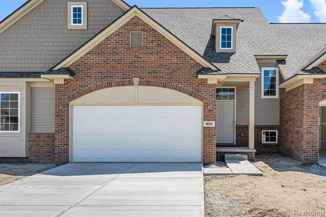 front view picture of 9056 Rhyan Rd, White Lake, MI. 48386