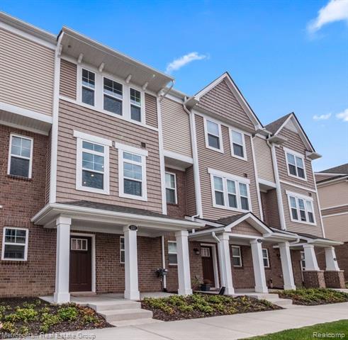 front view picture of 157 Monument Ln, Wixom, MI. 48393