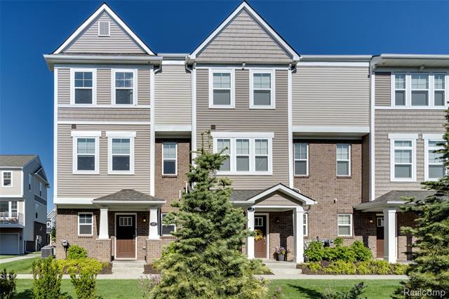 front view picture of 137 Monument Ln, Wixom, MI. 48393