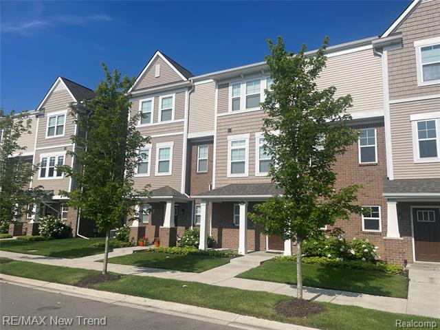 front view picture of 205 Monument Ln, Wixom, MI. 48393