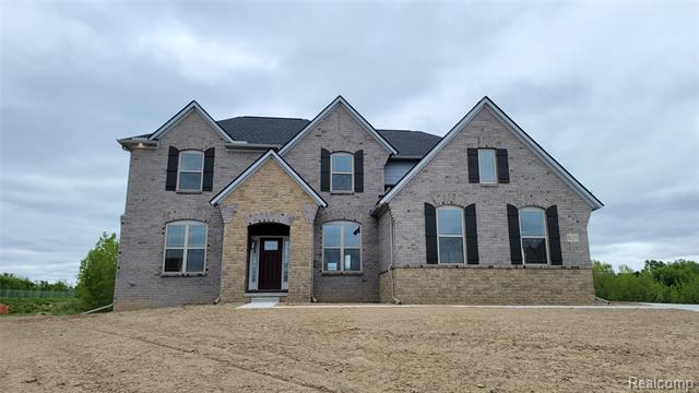 front view picture of 56213 Hickory Creek Ln, New Hudson, MI. 48165