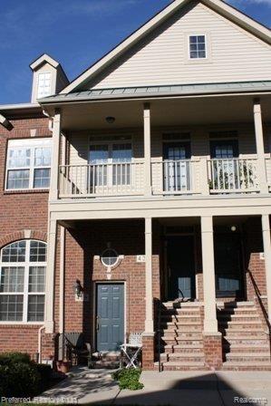 front view picture of 421 Old Pine Way, Walled Lake, MI. 48390