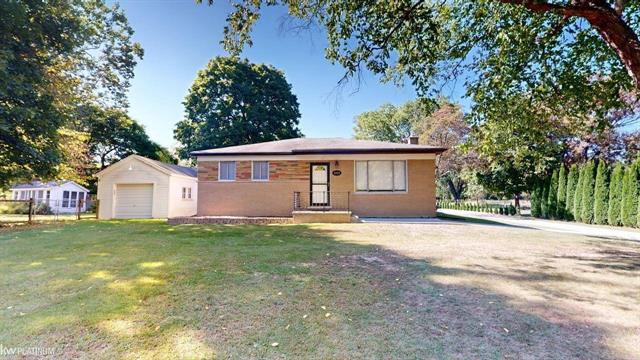 front view picture of 42125 Little Rd, Clinton Township, MI. 48036