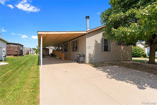 front view picture of 23279 Crystal Dr, Clinton Township, MI. 48036