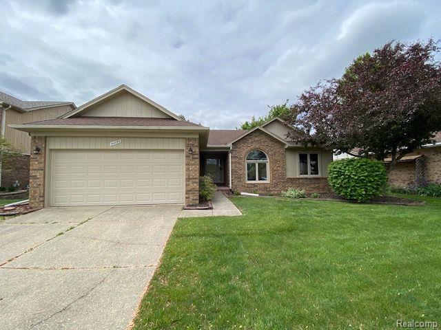 front view picture of 44099 Manitou Dr, Clinton Township, MI. 48038