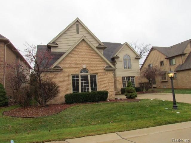 front view picture of 18770 River Pointe Dr, Clinton Township, MI. 48038