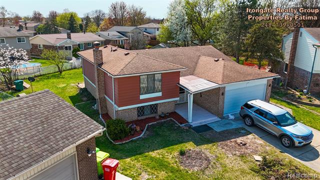 front view picture of 17906 Cider Mill Dr, Macomb, MI. 48044