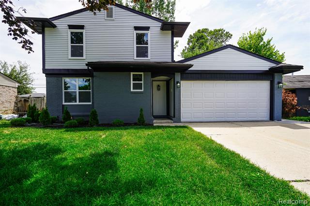 front view picture of 45293 Heatherwoode L, Macomb, MI. 48044