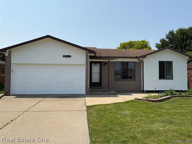 front view picture of 18260 Millstone Dr, Macomb, MI. 48044