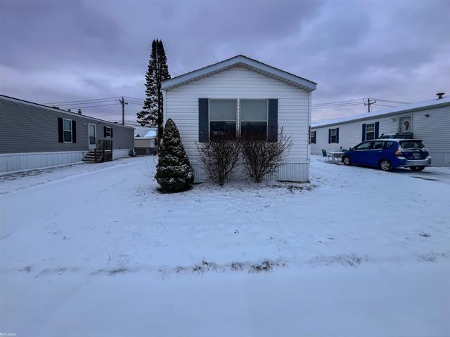 front view picture of 45130 Sheri Dr, Macomb, MI. 48044