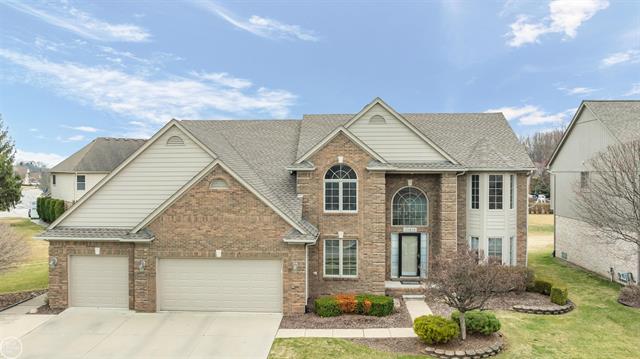 front view picture of 45819 Winthrop Pl, Macomb, MI. 48044