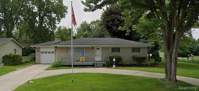 front view picture of 24110 Darwin St, Macomb, MI. 48042