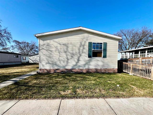 front view picture of 17037 Easterbridge St, Macomb, MI. 48044
