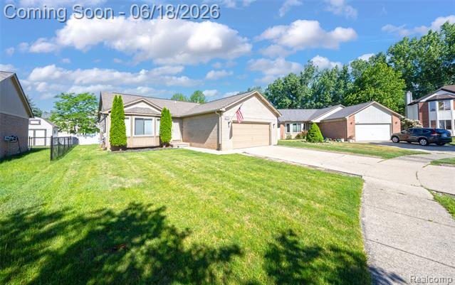 front view picture of 45925 Ashwood Ln, Macomb, MI. 48044