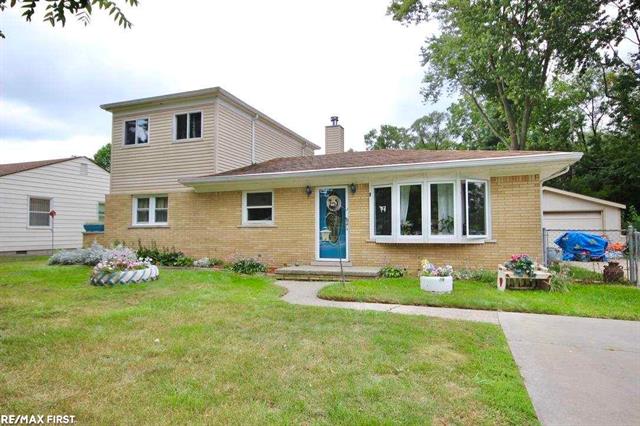 front view picture of 23330 Duprey Dr, Macomb, MI. 48042