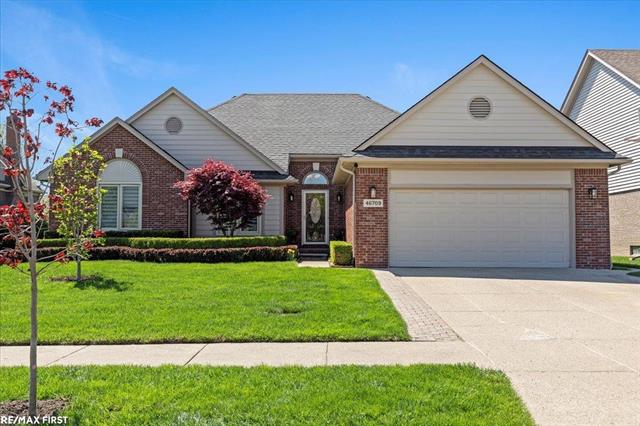 front view picture of 46709 Covington Dr, Macomb, MI. 48044