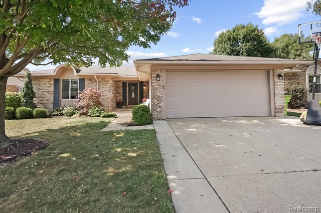 front view picture of 46457 Peach Grove Ave, Macomb, MI. 48044
