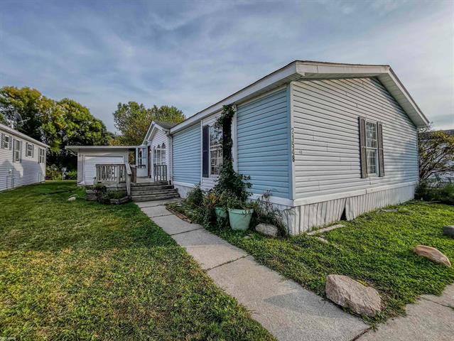 front view picture of 21548 Clochette Dr, Macomb, MI. 48044