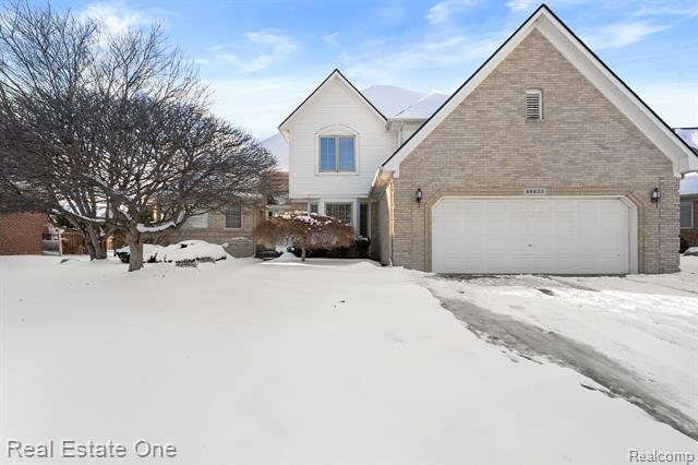front view picture of 46633 White Cap Dr, Macomb, MI. 48044