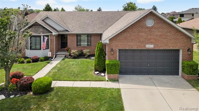 front view picture of 46173 Rocker Dr, Macomb, MI. 48044