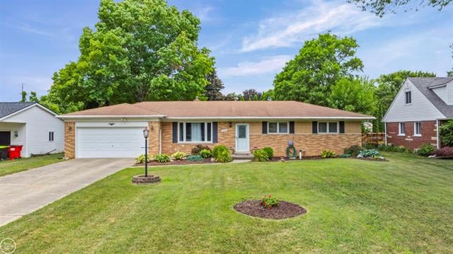 front view picture of 23209 Harrellson Rd, Macomb, MI. 48042
