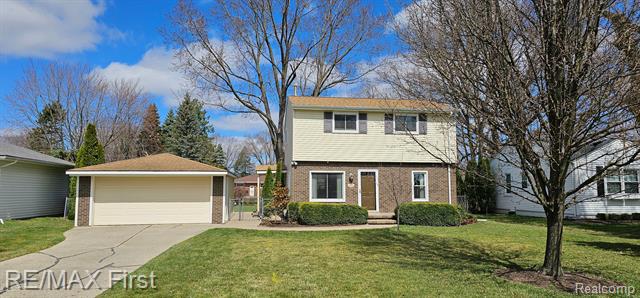 front view picture of 23351 Harrellson Rd, Macomb, MI. 48042