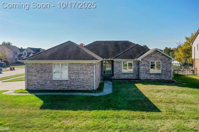 front view picture of 24182 Pointe Dr, Macomb, MI. 48042