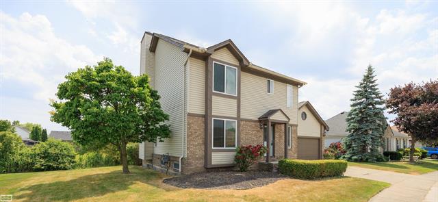 front view picture of 46395 Greenbriar Dr, New Baltimore, MI. 48051