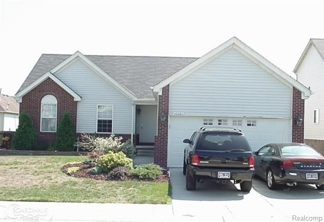 front view picture of 46684 E Briarwood Dr, New Baltimore, MI. 48051
