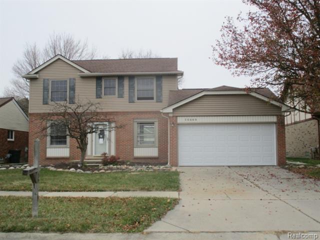 front view picture of 16669 Sarno Dr, Macomb, MI. 48044