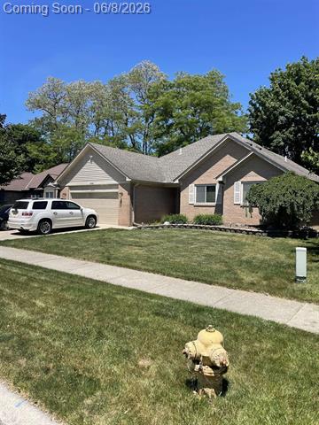 front view picture of 23945 Settlers Dr, Macomb, MI. 48042