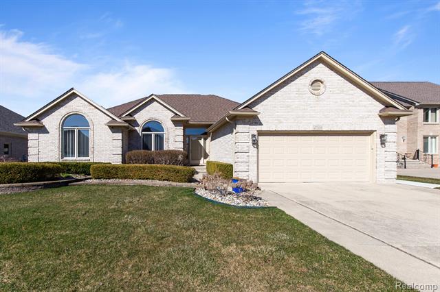 front view picture of 47209 Rockwood Dr, Macomb, MI. 48044