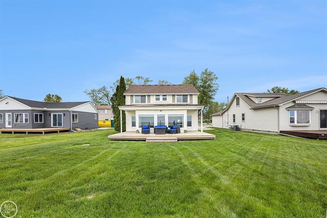 front view picture of 47060 Land Dr, New Baltimore, MI. 48047