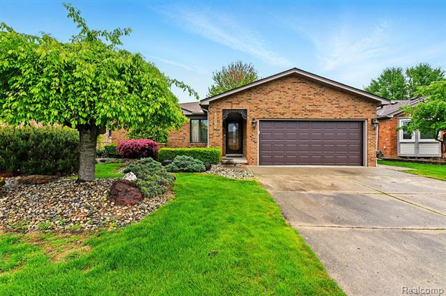 front view picture of 47296 Sanborn Dr, Macomb, MI. 48044