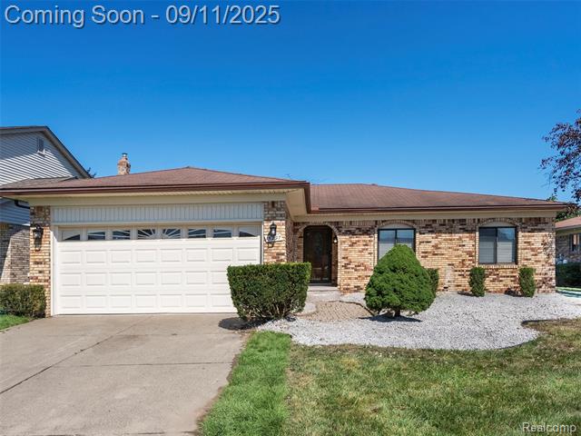 front view picture of 15297 Spruce Dr, Macomb, MI. 48044