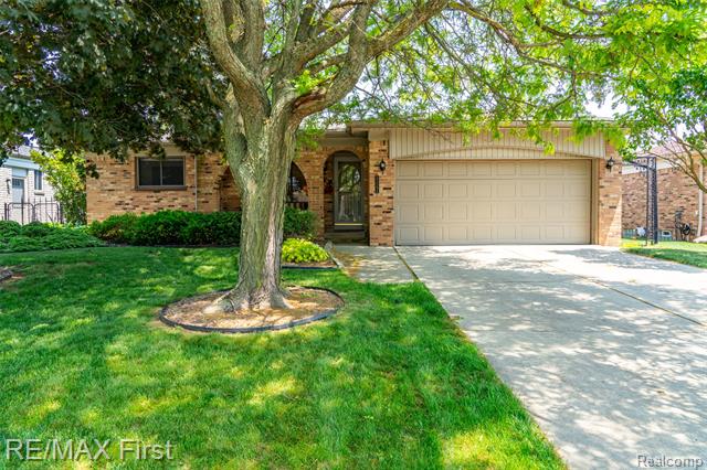 front view picture of 47798 Chrys Rd, Macomb, MI. 48044