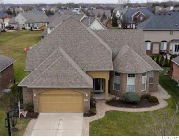 front view picture of 21617 Summerfield Dr, Macomb, MI. 48044